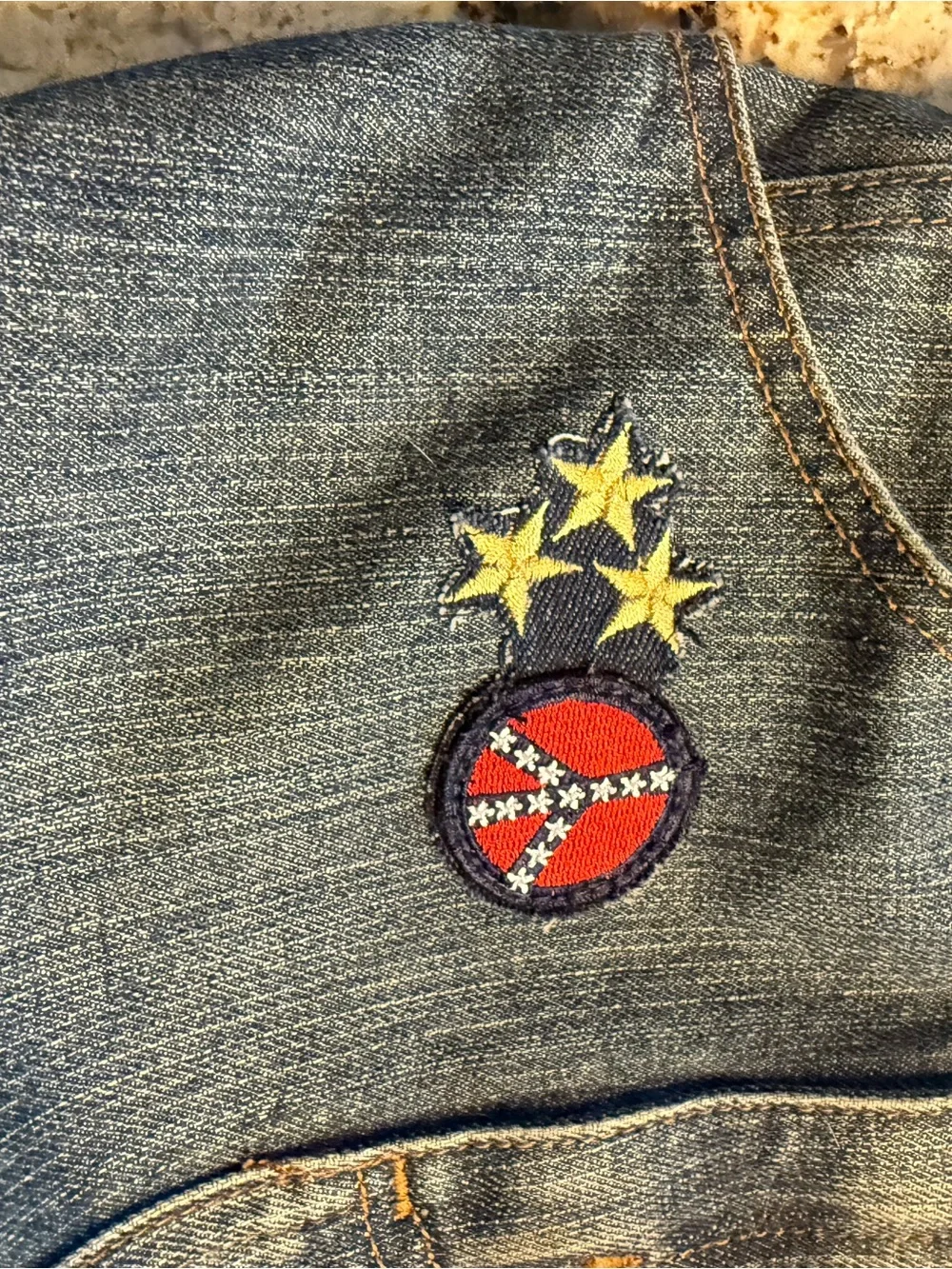 Denim Hobo Bag with Embroidered Accents and Tassel Charm